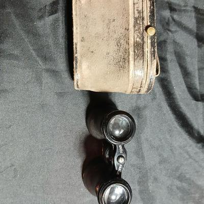 Antique opera glasses with leather case