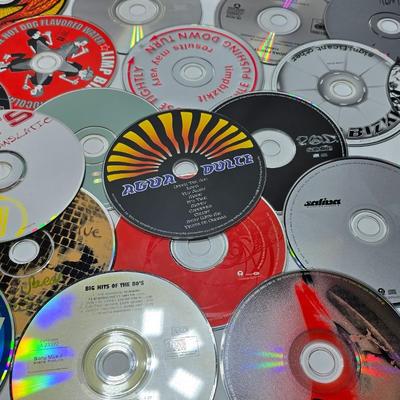 Huge assortment of CD Music discs without cases - Korn - 21 Guns - Austin Powers - Limp Biscuit - Cypress Hill and many more!