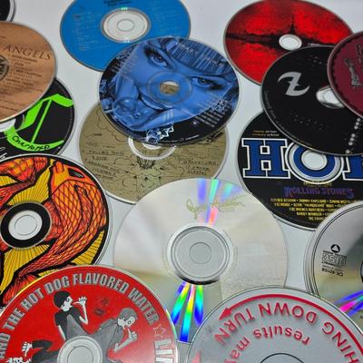 Huge assortment of CD Music discs without cases - Korn - 21 Guns - Austin Powers - Limp Biscuit - Cypress Hill and many more!