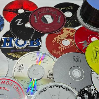 Huge assortment of CD Music discs without cases - Korn - 21 Guns - Austin Powers - Limp Biscuit - Cypress Hill and many more!