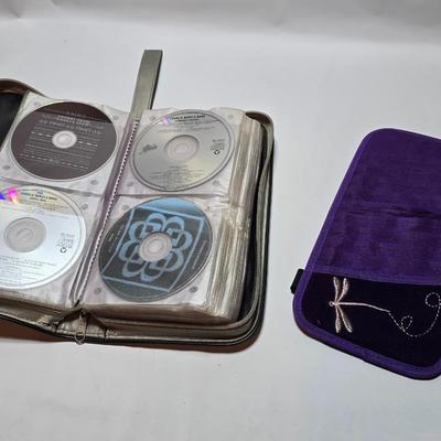 Zippered Storage for automobiles FULL of cd music - with a cd visor storage unit