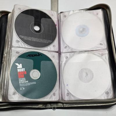 Zippered Storage for automobiles FULL of cd music - with a cd visor storage unit