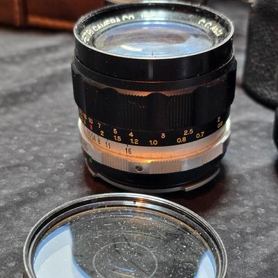 Petri 35MM FTE Camera With several Petri Lenses and nice leather Case and a tri[od