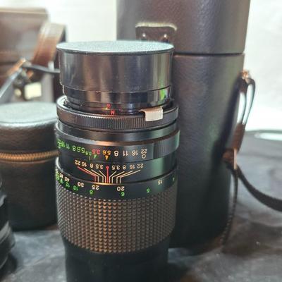 Petri 35MM FTE Camera With several Petri Lenses and nice leather Case and a tri[od