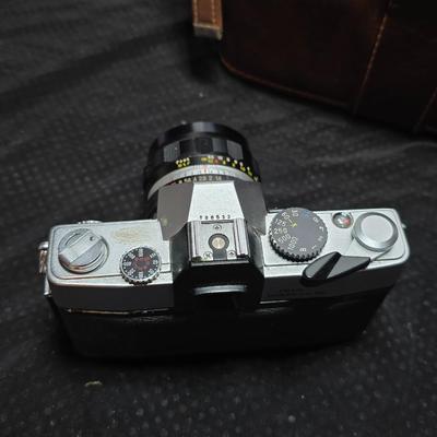 Petri 35MM FTE Camera With several Petri Lenses and nice leather Case and a tri[od