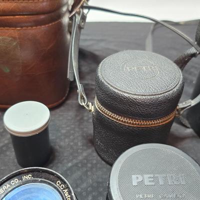 Petri 35MM FTE Camera With several Petri Lenses and nice leather Case and a tri[od