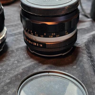 Petri 35MM FTE Camera With several Petri Lenses and nice leather Case and a tri[od