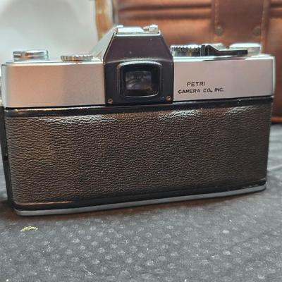 Petri 35MM FTE Camera With several Petri Lenses and nice leather Case and a tri[od
