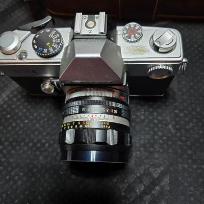 Petri 35MM FTE Camera With several Petri Lenses and nice leather Case and a tri[od