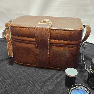 Petri 35MM FTE Camera With several Petri Lenses and nice leather Case and a tri[od