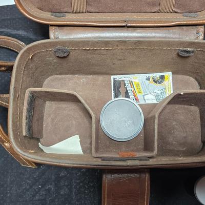 Petri 35MM FTE Camera With several Petri Lenses and nice leather Case and a tri[od