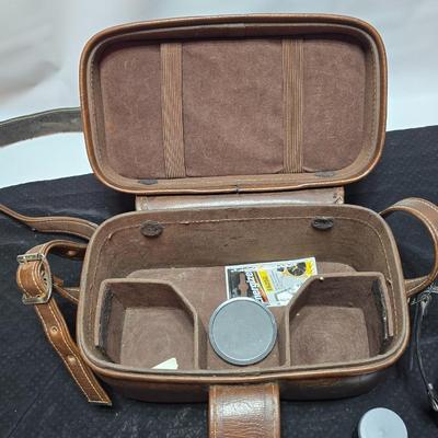 Petri 35MM FTE Camera With several Petri Lenses and nice leather Case and a tri[od