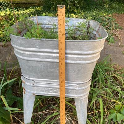 LOT 74: Unique Find - Wheeling Galvanized Wash Tub on Stand