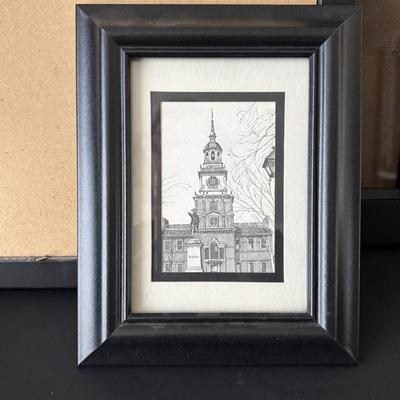 LOT 84: Home Decor Collection: Signed 1980 Photo of Philadelphia, Stained Glass Liberty Bell, Wall Clock, Lamp, Round Wall Mirror. 10x13...