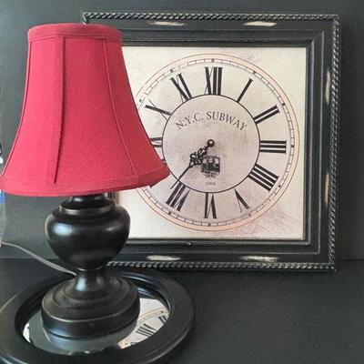 LOT 84: Home Decor Collection: Signed 1980 Photo of Philadelphia, Stained Glass Liberty Bell, Wall Clock, Lamp, Round Wall Mirror. 10x13...