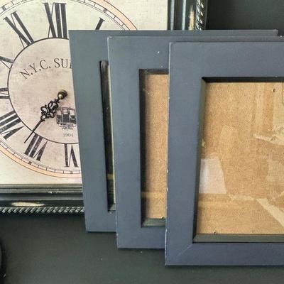 LOT 84: Home Decor Collection: Signed 1980 Photo of Philadelphia, Stained Glass Liberty Bell, Wall Clock, Lamp, Round Wall Mirror. 10x13...