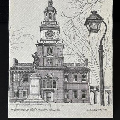 LOT 84: Home Decor Collection: Signed 1980 Photo of Philadelphia, Stained Glass Liberty Bell, Wall Clock, Lamp, Round Wall Mirror. 10x13...