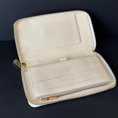 LOT 89: Louie Vuitton Damier Azur Zippy Organizer Long Wallet