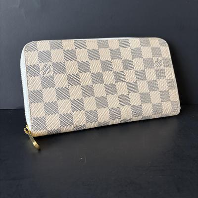 LOT 89: Louie Vuitton Damier Azur Zippy Organizer Long Wallet