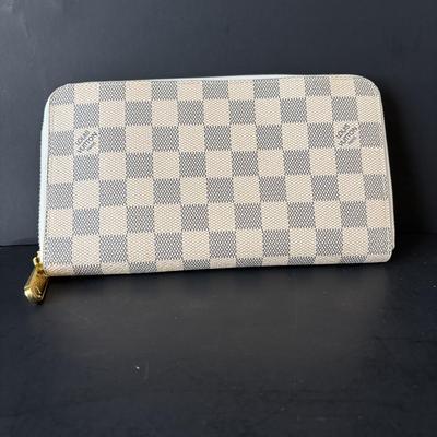 LOT 89: Louie Vuitton Damier Azur Zippy Organizer Long Wallet