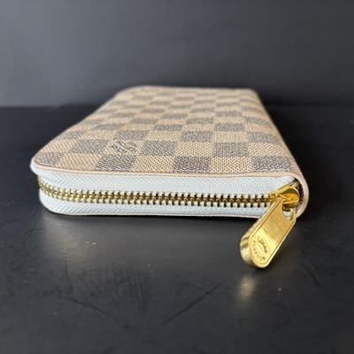 LOT 89: Louie Vuitton Damier Azur Zippy Organizer Long Wallet