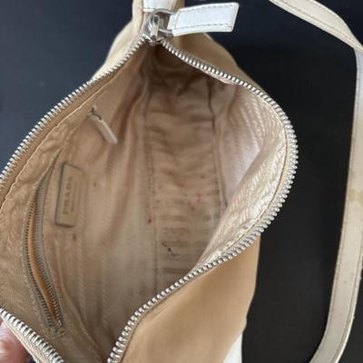 LOT 91: Prada Beige Nylon Shoulder Bag, Kate Spade Square Black Wallet and Coach Signature Wallet