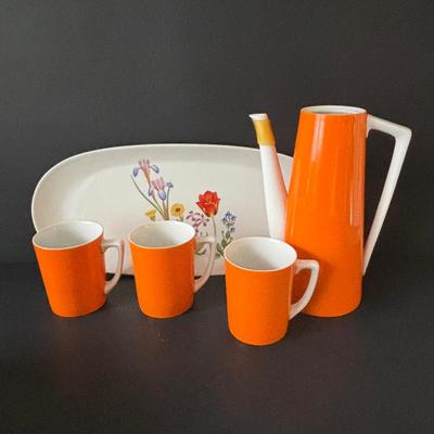 LOT 100: MCM Teapot (missing top), Teacups, Made in USA Green Rim Plates, Saltera Winter Dogwood Plate & More