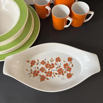 LOT 100: MCM Teapot (missing top), Teacups, Made in USA Green Rim Plates, Saltera Winter Dogwood Plate & More