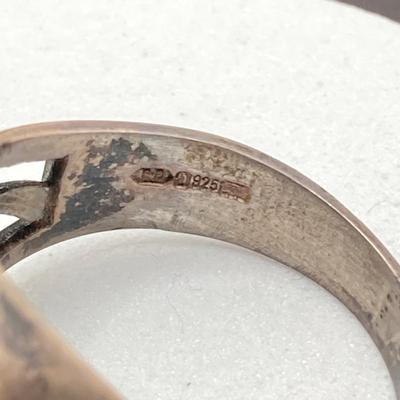 LOT 115: Pair of Sterling Silver Rings - Sizes 10 and 12