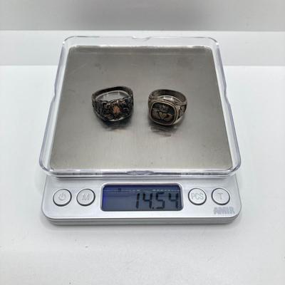 LOT 115: Pair of Sterling Silver Rings - Sizes 10 and 12