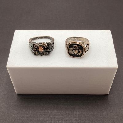 LOT 115: Pair of Sterling Silver Rings - Sizes 10 and 12
