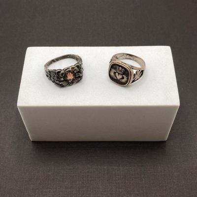 LOT 115: Pair of Sterling Silver Rings - Sizes 10 and 12