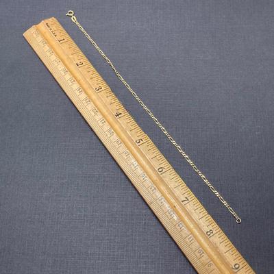LOT 118: Gold Figaro Chain Link Bracelet - 18KT / 750, TW 1.72 gtw, 8 Inch