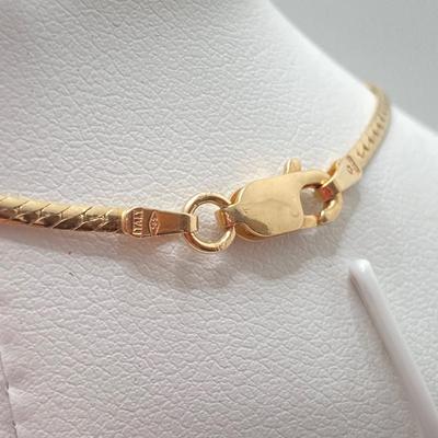 LOT 124: 14k Gold Emerald and Diamond Necklace - 14KT / 585, TW 4.91 gtw