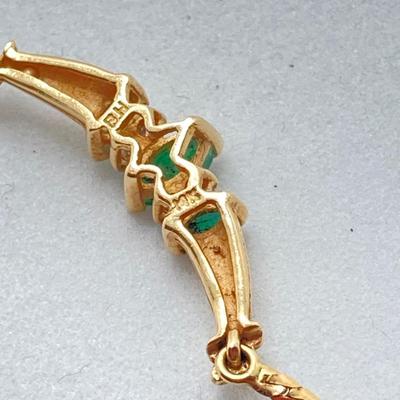LOT 124: 14k Gold Emerald and Diamond Necklace - 14KT / 585, TW 4.91 gtw