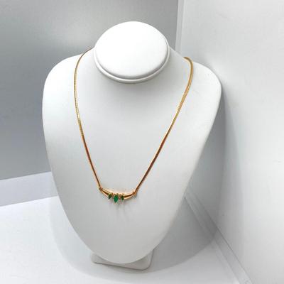 LOT 124: 14k Gold Emerald and Diamond Necklace - 14KT / 585, TW 4.91 gtw
