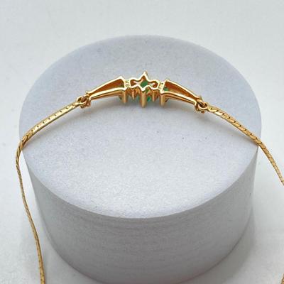 LOT 124: 14k Gold Emerald and Diamond Necklace - 14KT / 585, TW 4.91 gtw
