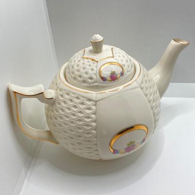 LOT 128: Donegal Ireland Parian China (Millennium 2000 Ad) Claddagh Teapot with Cream and Sugar Bowls