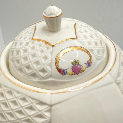 LOT 128: Donegal Ireland Parian China (Millennium 2000 Ad) Claddagh Teapot with Cream and Sugar Bowls