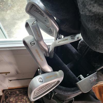 LOT 140: Set of Dunlop Golf Clubs in Golf Bag with Multiple Golf Balls, Tees and More