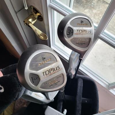 LOT 140: Set of Dunlop Golf Clubs in Golf Bag with Multiple Golf Balls, Tees and More