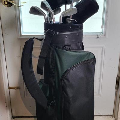 LOT 140: Set of Dunlop Golf Clubs in Golf Bag with Multiple Golf Balls, Tees and More