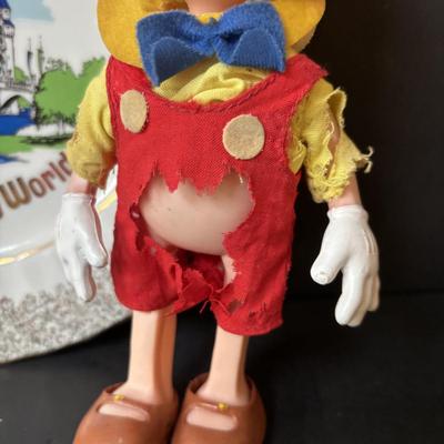 LOT 162: Lassie Melmac Dinnerware Plate, Walt Disney Productions Mickey Mouse & Pinocchio Dolls, Disney Hats, Mug, Ornaments & More