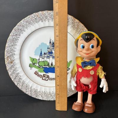 LOT 162: Lassie Melmac Dinnerware Plate, Walt Disney Productions Mickey Mouse & Pinocchio Dolls, Disney Hats, Mug, Ornaments & More