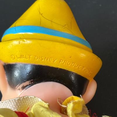 LOT 162: Lassie Melmac Dinnerware Plate, Walt Disney Productions Mickey Mouse & Pinocchio Dolls, Disney Hats, Mug, Ornaments & More