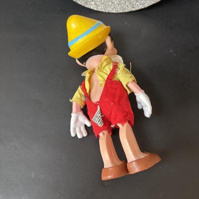 LOT 162: Lassie Melmac Dinnerware Plate, Walt Disney Productions Mickey Mouse & Pinocchio Dolls, Disney Hats, Mug, Ornaments & More