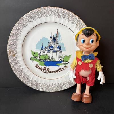 LOT 162: Lassie Melmac Dinnerware Plate, Walt Disney Productions Mickey Mouse & Pinocchio Dolls, Disney Hats, Mug, Ornaments & More