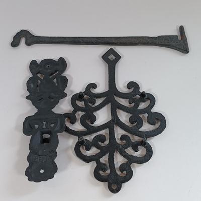 LOT 185: Cast Iron Trivets, Pewter Bean Pots, Pressed Glass Cakestand & More