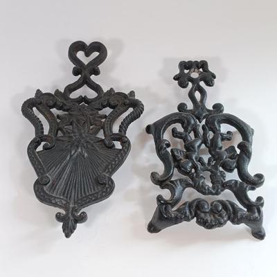 LOT 185: Cast Iron Trivets, Pewter Bean Pots, Pressed Glass Cakestand & More