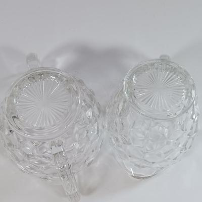 LOT 185: Cast Iron Trivets, Pewter Bean Pots, Pressed Glass Cakestand & More